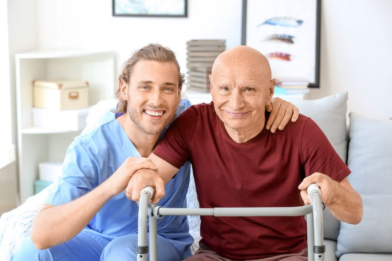 Elderly man with caregiver 