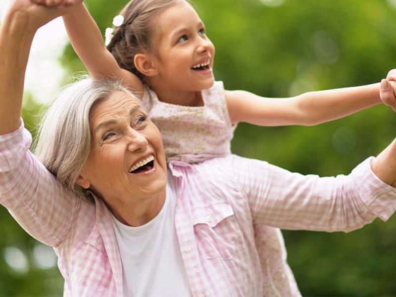 Elderly woman with granddaughter