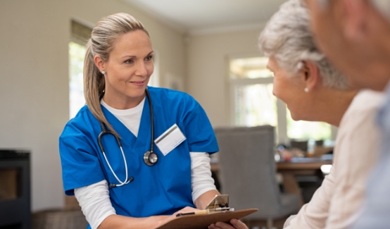 Nurse talking to patients