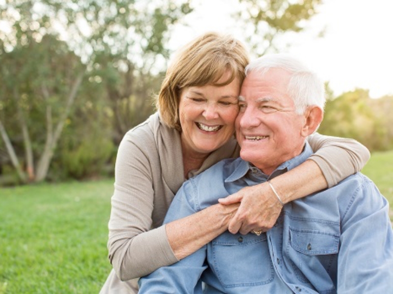 Elderly Couple embracing